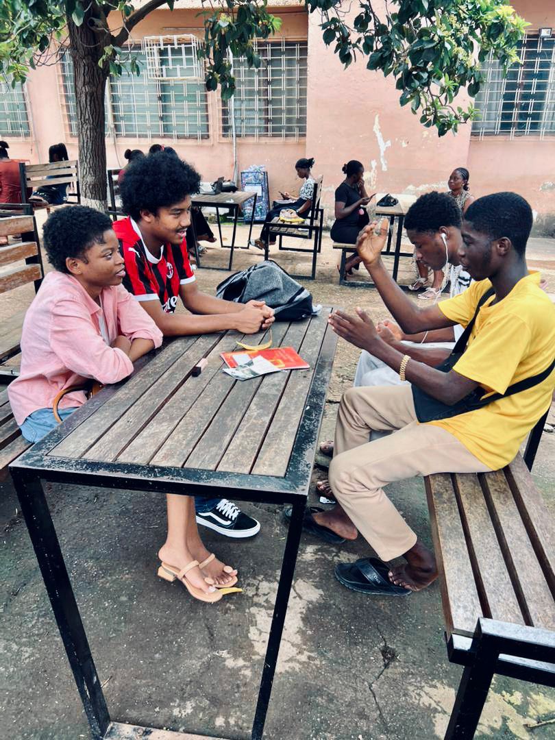 Kings & Priests yearbook close-up highlighting layered fabrics in motion during praise.